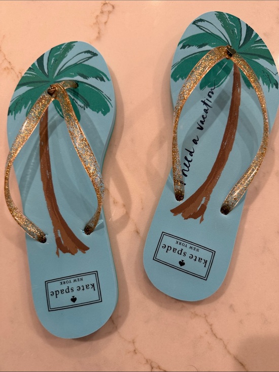 kate spade Shoes - kate spade light blue flip flops with green palm and gold glitter straps